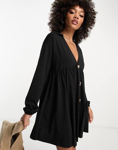 Robe babydoll courte à manches longues et boutons - Noir - Asos Design - Modalova