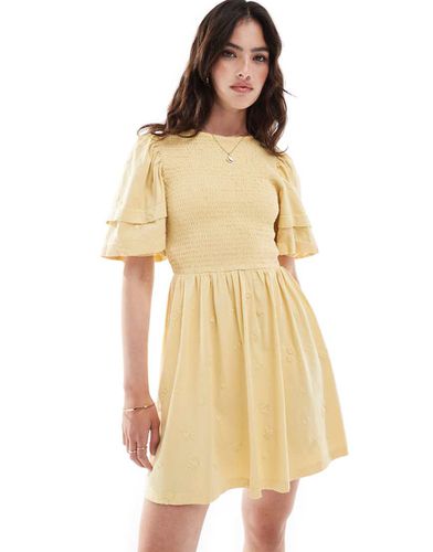 Robe courte à manches bouffantes et broderies - Jaune - Asos Design - Modalova