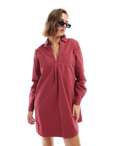 Robe courte et droite en sergé de coton avec poches et ourlet brut - Rouge framboise - Asos Design - Modalova