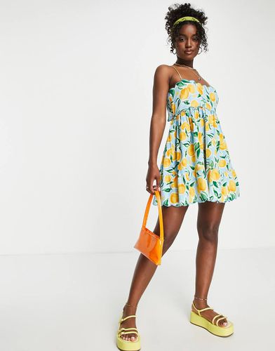 Robe d'été courte à dos découpé et bordures festonnées - Imprimé orange - Asos Design - Modalova