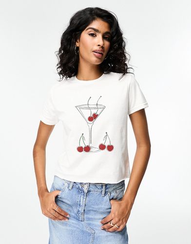 T-shirt effet rétréci à imprimé cerises et boisson Martini - Asos Design - Modalova