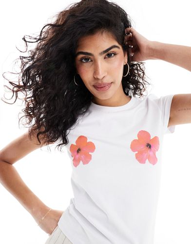 T-shirt effet rétréci à imprimé fleurs d'hibiscus - Asos Design - Modalova