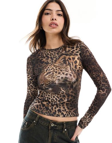 T-shirt effet rétréci à manches longues en tulle imprimé tête de léopard - Asos Design - Modalova