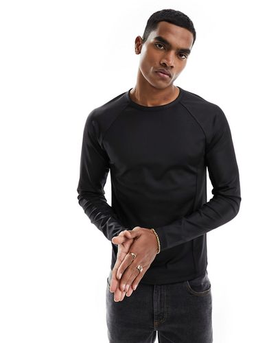 T-shirt moulant à manches longues et à surpiqûres - Noir - Asos Design - Modalova