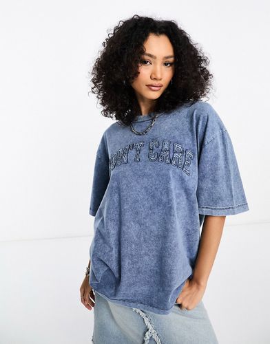 T-shirt oversize avec motif Don't Care - denim délavé - Asos Design - Modalova