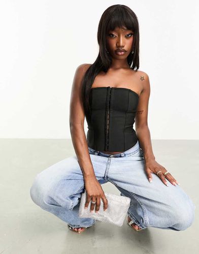 Top corset à bandes avec fermeture à agrafes - Asos Design - Modalova