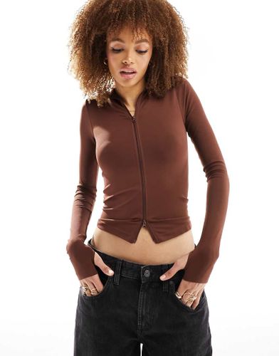 Top sans coutures effet sculptant à manches longues et fermeture éclair - Chocolat - Asos Design - Modalova