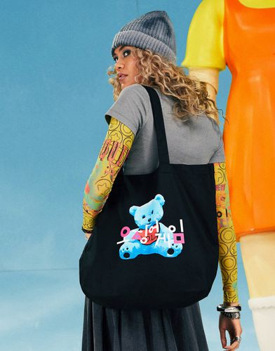 X Squid Game: le défi - Tote bag à imprimé ours - Asos Design - Modalova