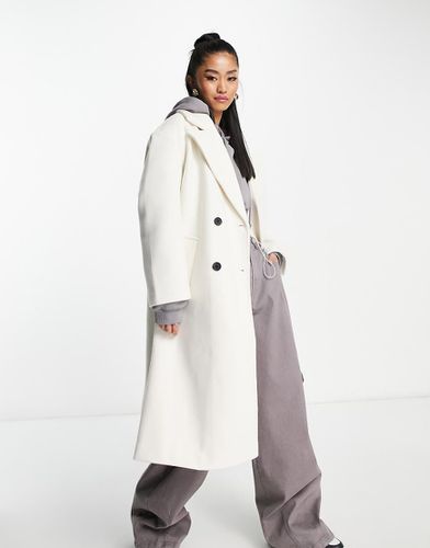 Manteau ajusté à double boutonnage - Écru - Bershka - Modalova