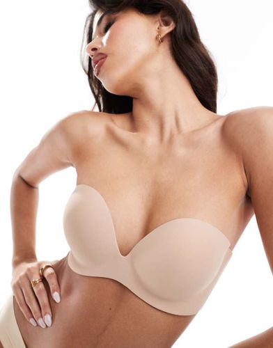 Soutien-gorge dos-nu sans bretelles adhésif avec côtés transparents - Beige - Bye Bra - Modalova