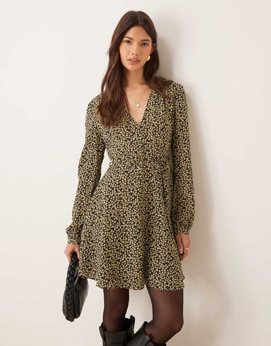 Robe courte à petites fleurs avec manches longues et col en V - Noir et jaune - Glamorous - Modalova