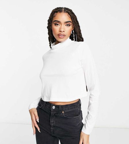 Exclusivité ASOS - Nekku - Crop top à manches longues - The North Face - Modalova