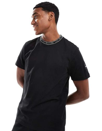 Exclusivité ASOS - T-shirt de sport avec logo - Calvin Klein - Modalova