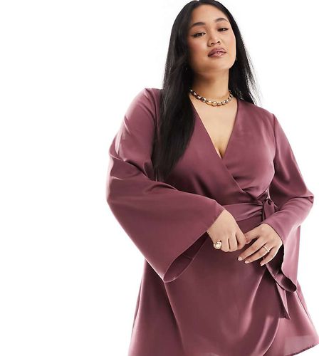 Exclusivité - ASOS DESIGN Curve - Robe portefeuille courte en satin avec liens noués à la taille - Asos Curve - Modalova