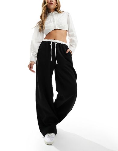 Pantalon ample à taille contrastante - Noir et blanc - Kaiia - Modalova