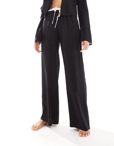 Pantalon de plage d'ensemble ample en lin avec bords contrastants et cordon de serrage - Kaiia - Modalova