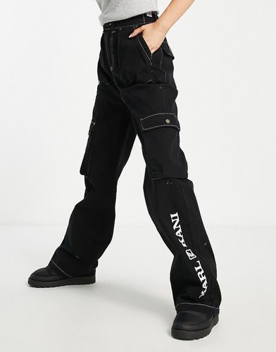 élégants et chinos Pantalons moulants Femme Vêtements Pantalons décontractés Pantalon Synthétique Karlkani en coloris Noir 