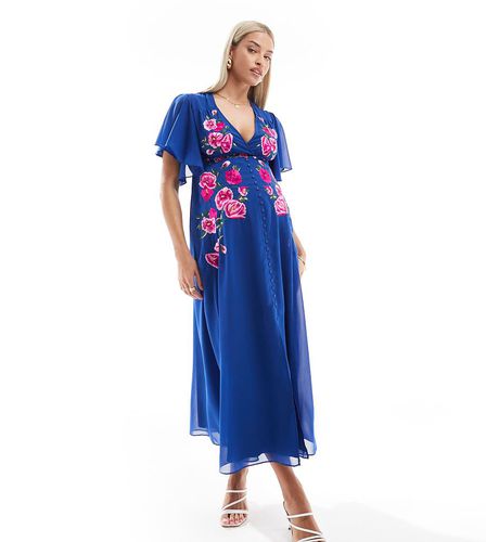 Robe mi-longue brodée avec manches fluides - Hope & Ivy Maternity - Modalova