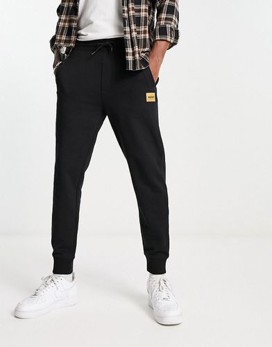 HUGO - Doak - Pantalon de jogging coupe standard à logo doré - Hugo Red - Modalova