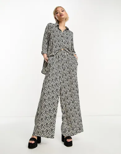 Pantalon d'ensemble ample à imprimé géométrique - Noir et blanc - Object - Modalova