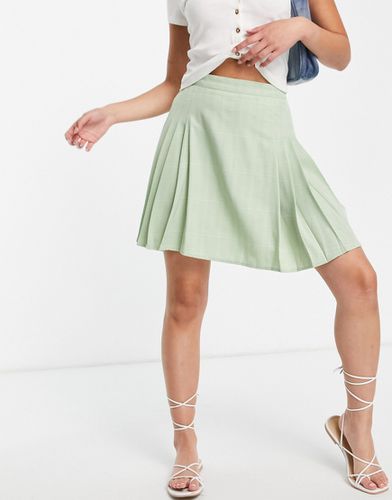 Mini-jupe de tennis plissée à carreaux - Lola May - Modalova