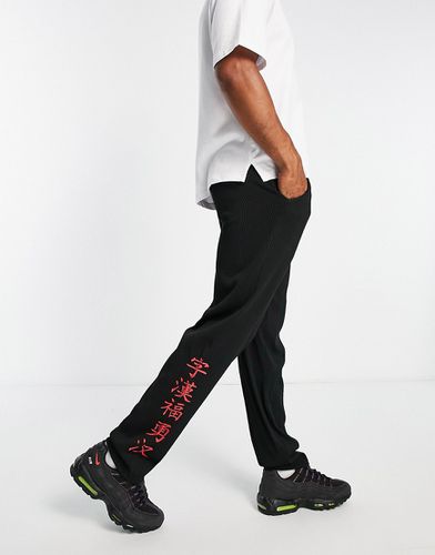 Pantalon droit plissé avec inscriptions en japonais - Liquor N Poker - Modalova