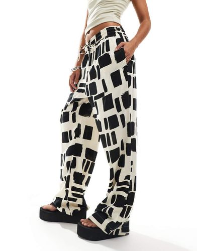 Pantalon avec effet coups de pinceau - Noir et blanc - Monki - Modalova