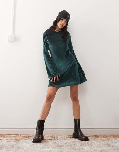 Robe courte à manches longues en velours - Monki - Modalova