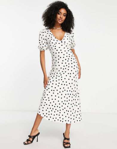 Robe mi-longue à pois avec manches bouffantes et col V - Mango - Modalova