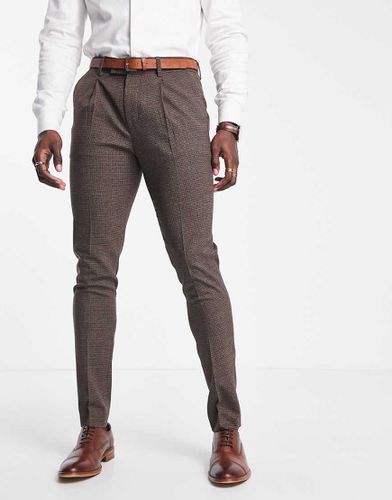 Pantalon de costume ajusté en laine mélangée stretch bidirectionnel à motif pied-de-poule - Noak - Modalova