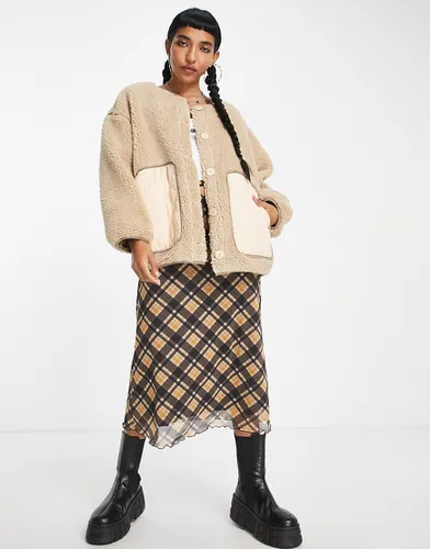 Veste en peau de mouton avec poches contrastantes en nylon - Native Youth - Modalova