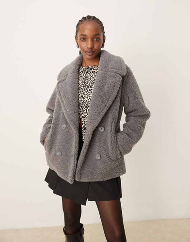 Manteau court imitation peau de mouton - New Look - Modalova