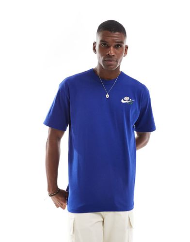 T-shirt avec logo virgule et fleur - Nike - Modalova