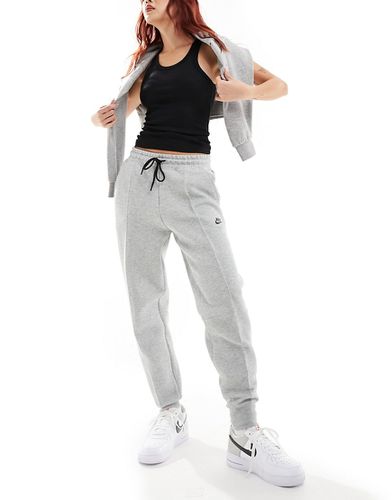 Tech - Pantalon de jogging en polaire - chiné foncé - Nike - Modalova