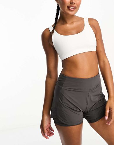 Alate - Brassière de sport en tissu Dri-FIT - Nike Training - Modalova