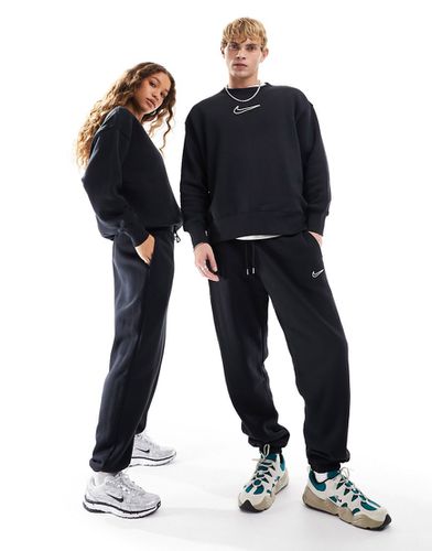 Midi - Pantalon unisexe à logo virgule - Nike - Modalova