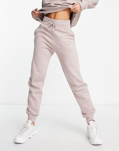 Pantalon de jogging coupe classique à petit logo virgule - Taupe - Nike - Modalova
