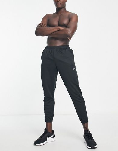 Challenger Repel - Jogger en tissu Therma-FIT - Nike Running - Modalova