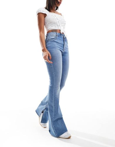 Jean stretch vas  ourlet fendu - moyen - Stradivarius - Modalova