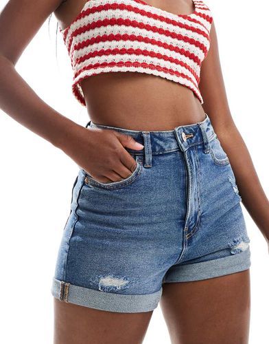 Short en jean coupe slim mom - moyen - Stradivarius - Modalova