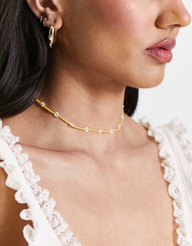 Collier de perles avec détail pâquerettes - Sui Ava - Modalova