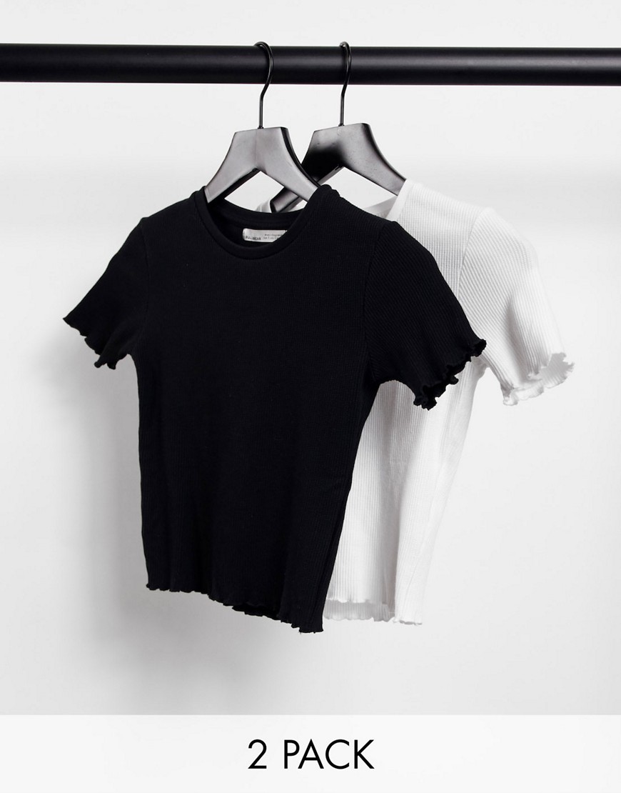 Lot de 2 t-shirts crop top à bordure ondulée - Noir et blanc - Pull & bear - Modalova
