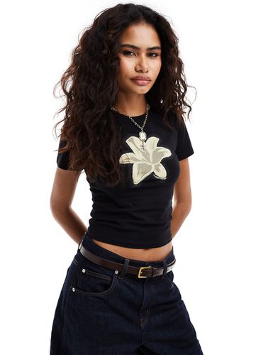 T-shirt côtelé à manches courtes à imprimé fleur - Délavé - Reclaimed Vintage - Modalova