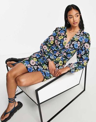 Robe courte à fleurs torsadée sur le devant - River Island - Modalova