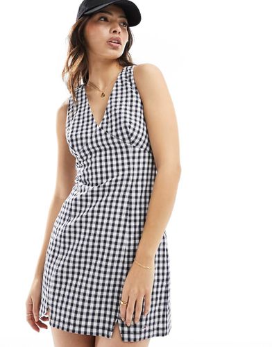 Robe courte à carreaux vichy et bretelles fines - Tommy Jeans - Modalova