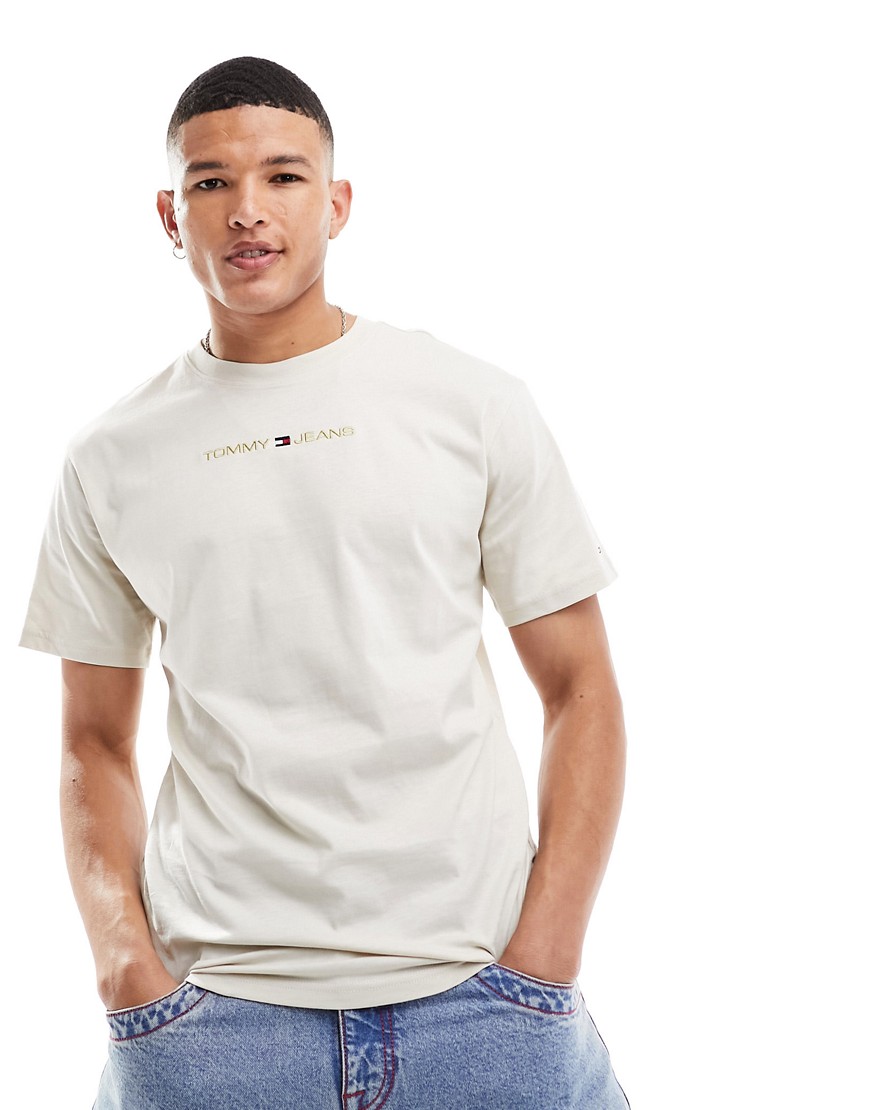 T-shirt coupe classique à logo linéaire doré - Beige - Tommy Jeans - Modalova