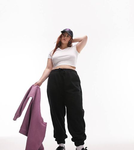 Pantalon de jogging d'ensemble oversize resserré aux chevilles - Topshop Curve - Modalova