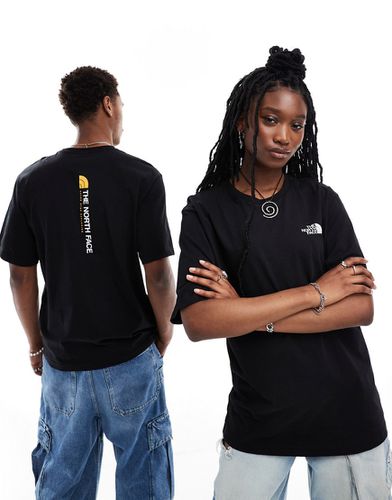 NSE - T-shirt oversize à logo imprimé verticalement au dos - The North Face - Modalova