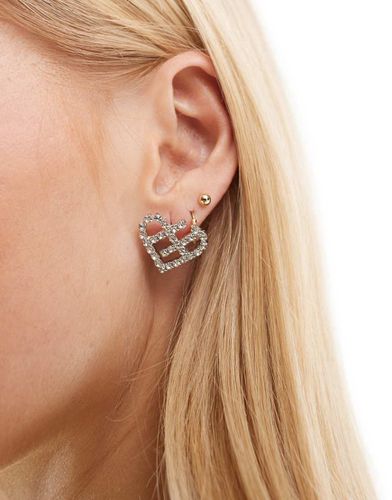 Boucles d'oreilles caurs ornés de strass avec découpes - True Decadence - Modalova