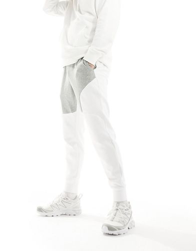 Unstoppable - Pantalon de jogging en molleton color block - et blanc - Under Armour - Modalova